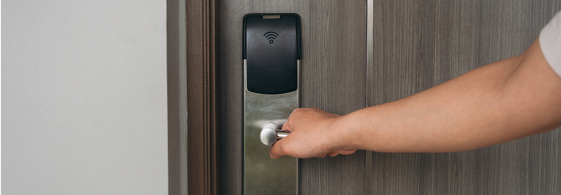 A Peterborough Locksmith man opening door